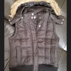 Puffer vest with faux fur trim hood
